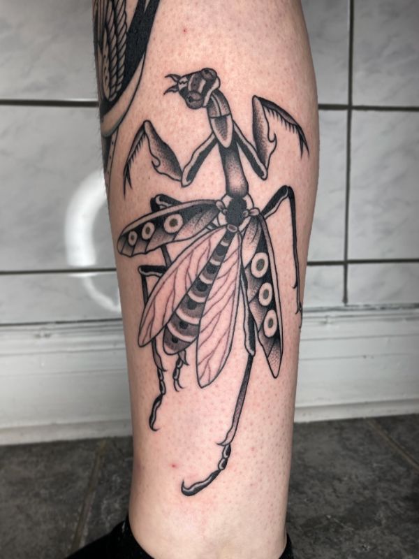 Praying mantis leg tattoo