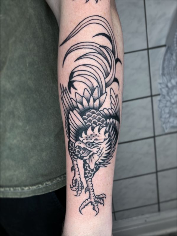 Rooster arm tattoo
