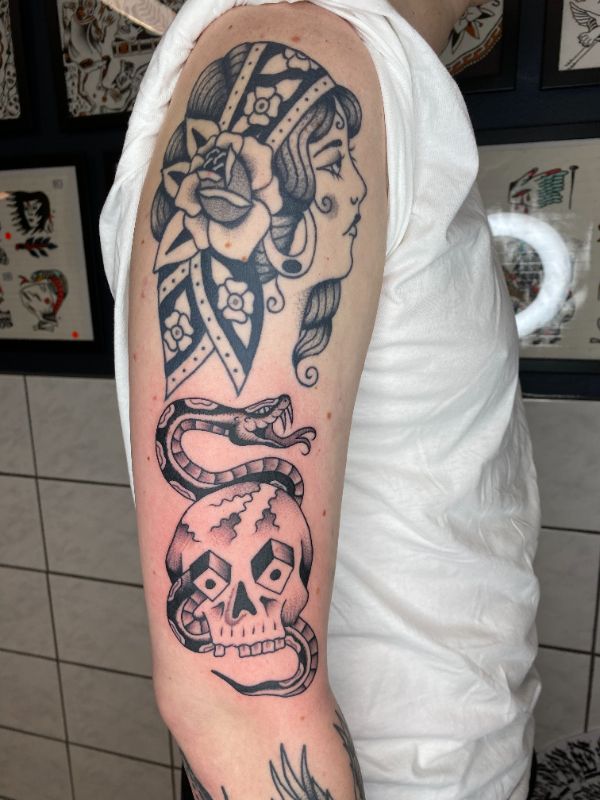 Traditional skull with snake